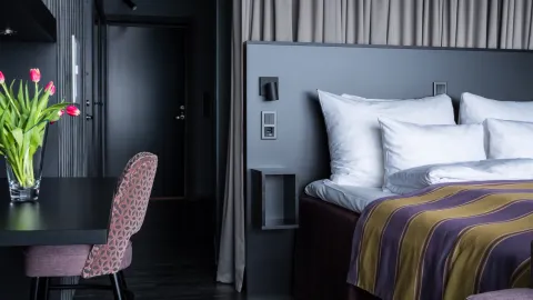 Bed and in the Deluxe Aurora rooms