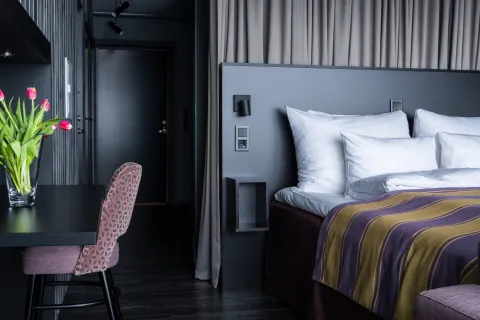 Bed and in the Deluxe Aurora rooms